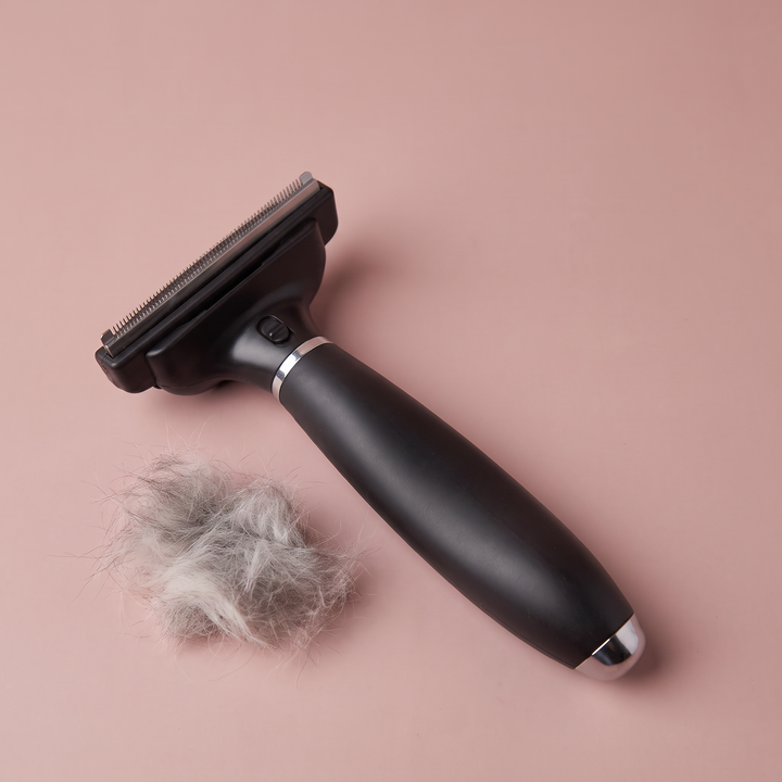 Deslanador para perros de pelo corto con pelo retirado